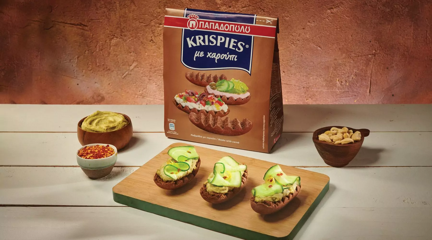 image for KRISPIES Παπαδοπούλου με χαρούπι, vegan ‘τυρί’ κρέμα με κάσιους και αβοκάντο, αγγούρι, λεμόνι και μπούκοβο