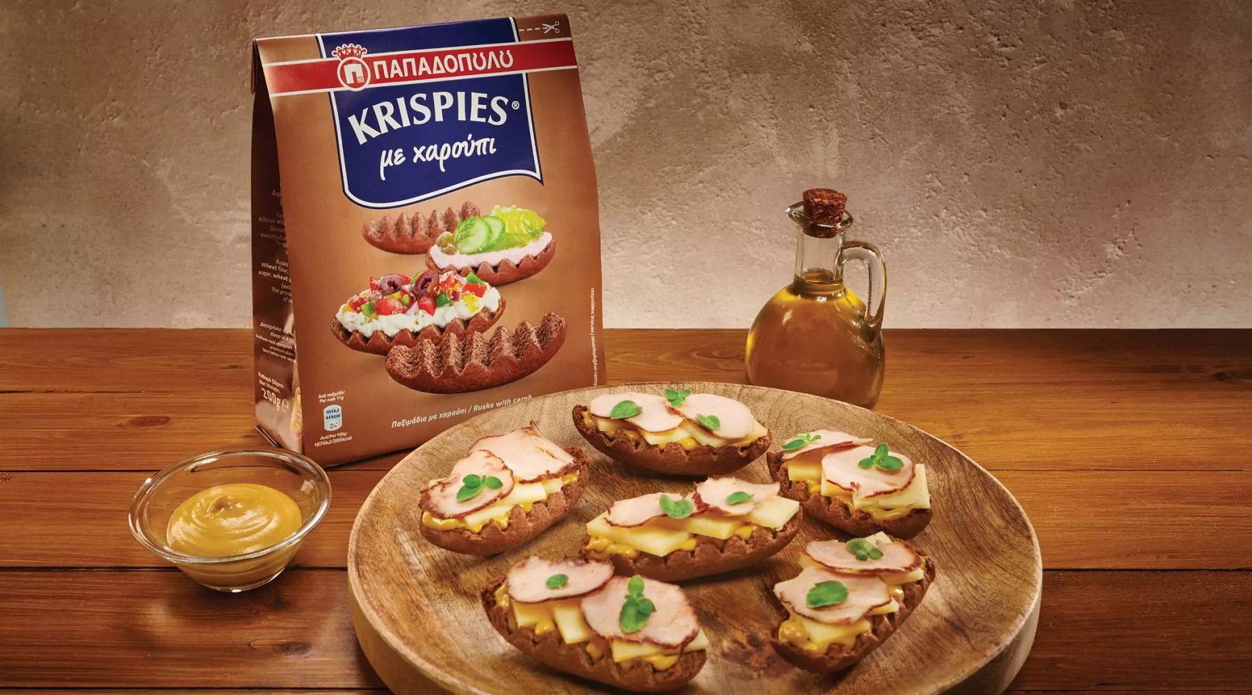 Top slider image for KRISPIES Παπαδοπούλου με χαρούπι, τυρί μετσοβόνε, απάκι και σως μουστάρδα-μέλι